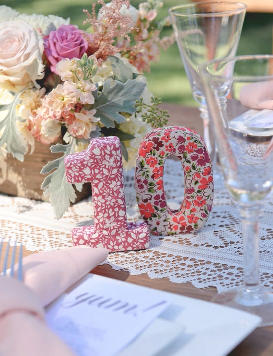 funky patterned table numbers @weddingchicks
