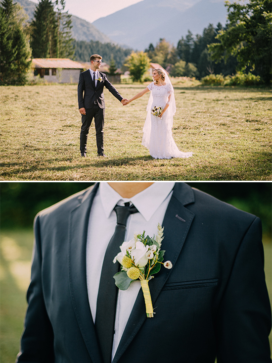 Happy bride and groom holding hands in a scenic outdoor wedding