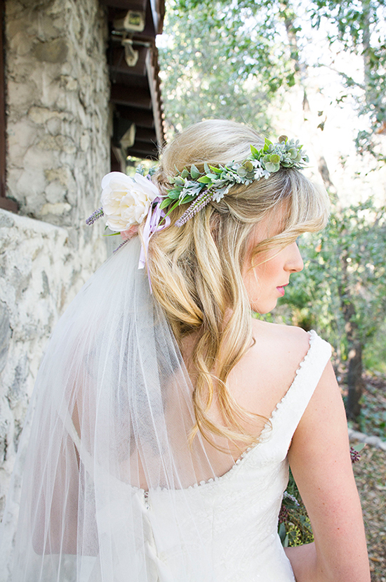 Bride wearing a floral crown and veil, wedding dress, outdoor setting