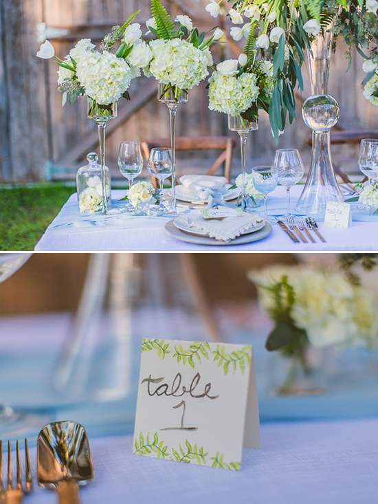 Elegant wedding table setting with white flowers and decorations