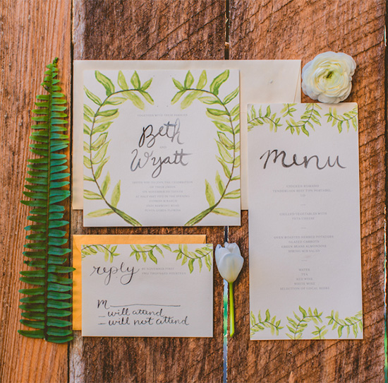 Elegant watercolor wedding stationery with fern theme and calligraphy
