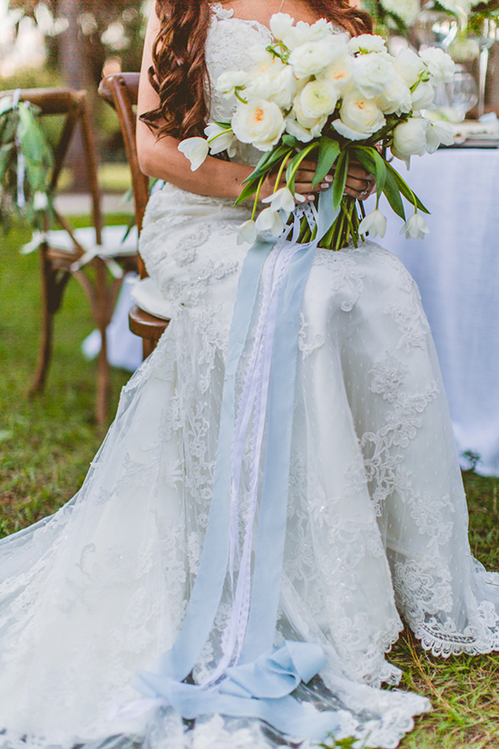 white wedding boquet with blue ribbon @weddingchicks
