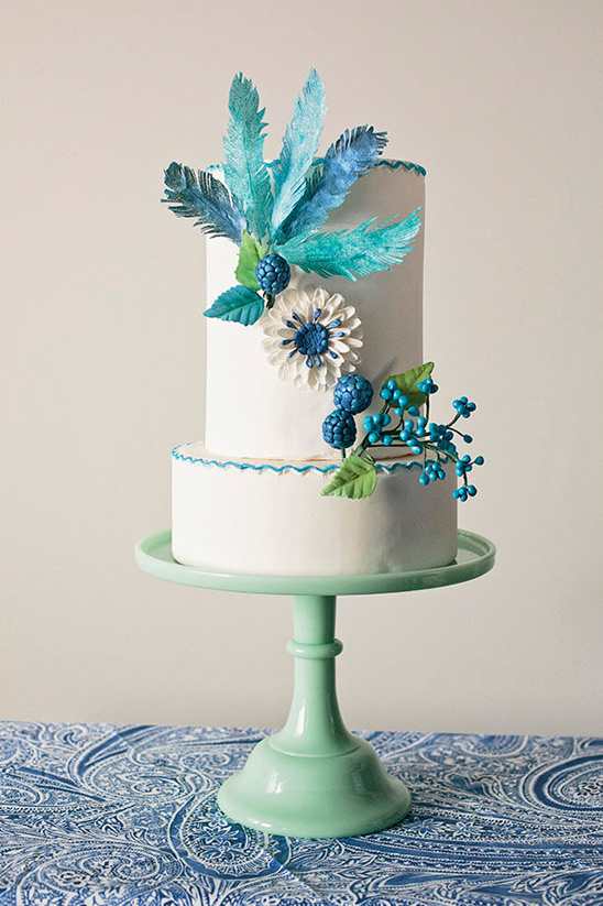 feather and flower accented cake @weddingchicks