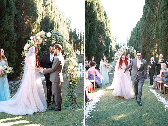 Couple exchanging vows and walking at a lovely outdoor wedding ceremony