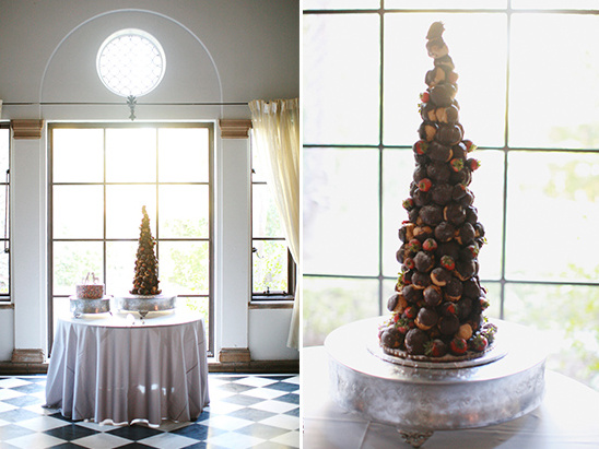 Elegant Croquembouche Cake on Table in Light Filled Room