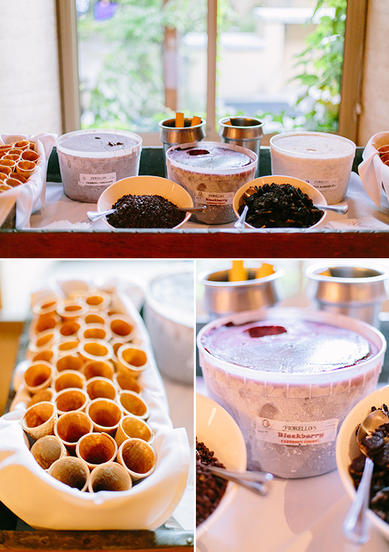 Ice cream buffet with toppings and waffle cones ready to serve