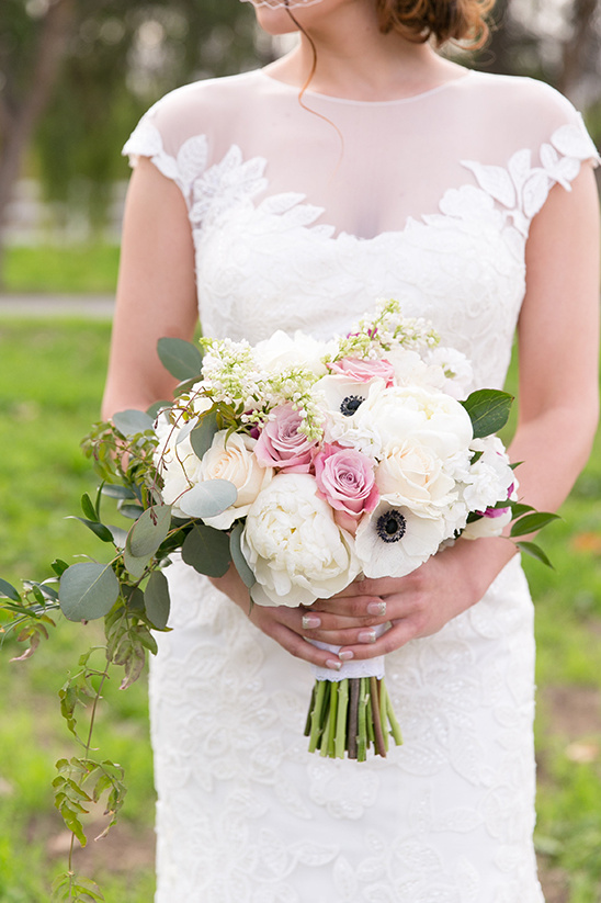 Bride holding a beautiful bouquet of flowers on her wedding day