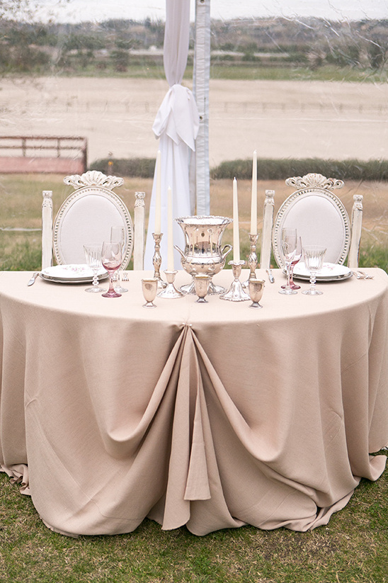 Elegant table setting for a wedding reception outdoors, ready