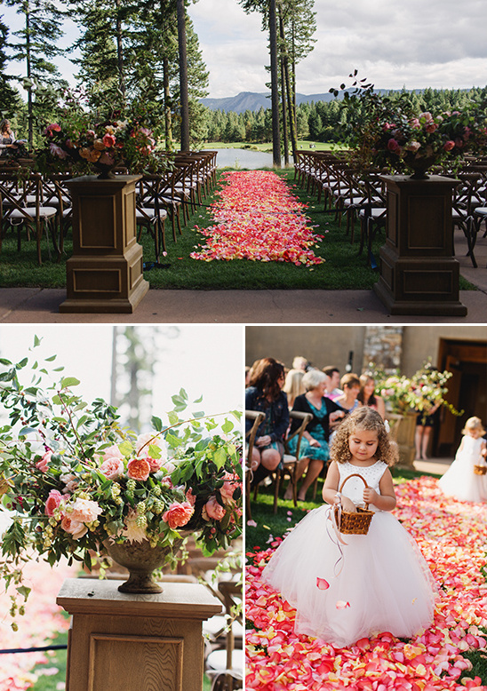 Wedding aisle with rose petals, flower girl, and forest views