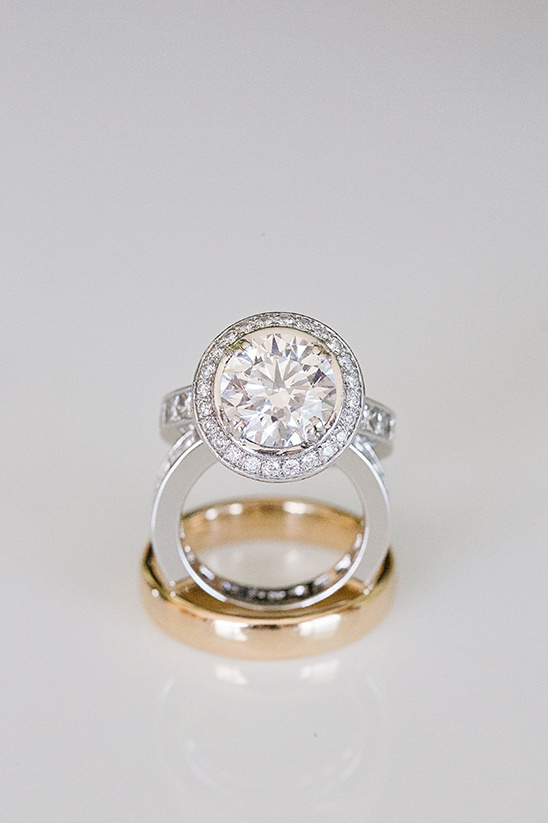 Elegant diamond engagement ring with gold wedding bands