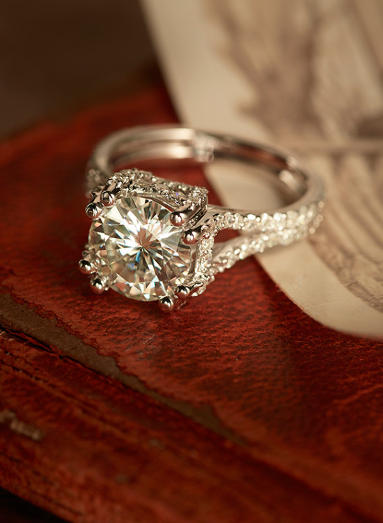 Sparkling diamond ring on textured red surface