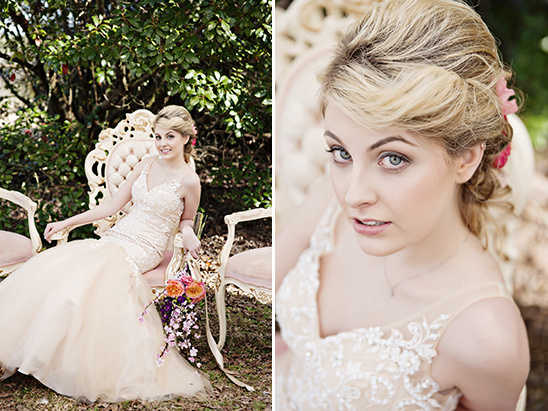 Bride in vintage gown sits outdoors on ornate chair