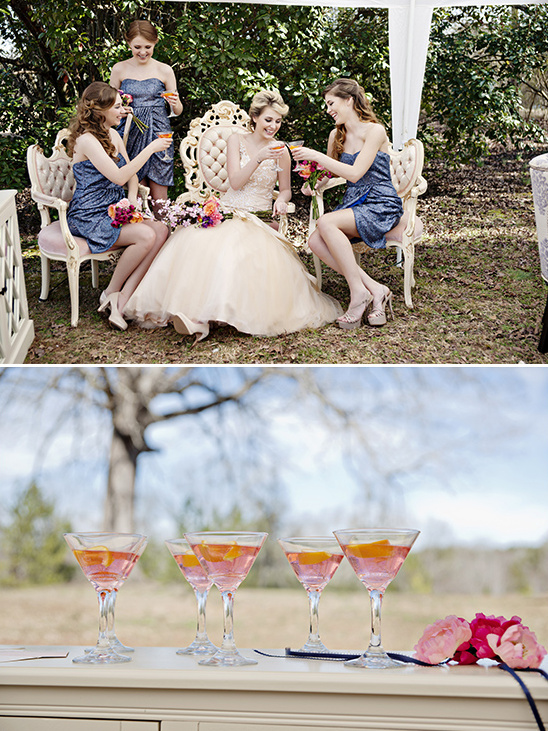 Bride and bridesmaids toasting at an outdoor wedding