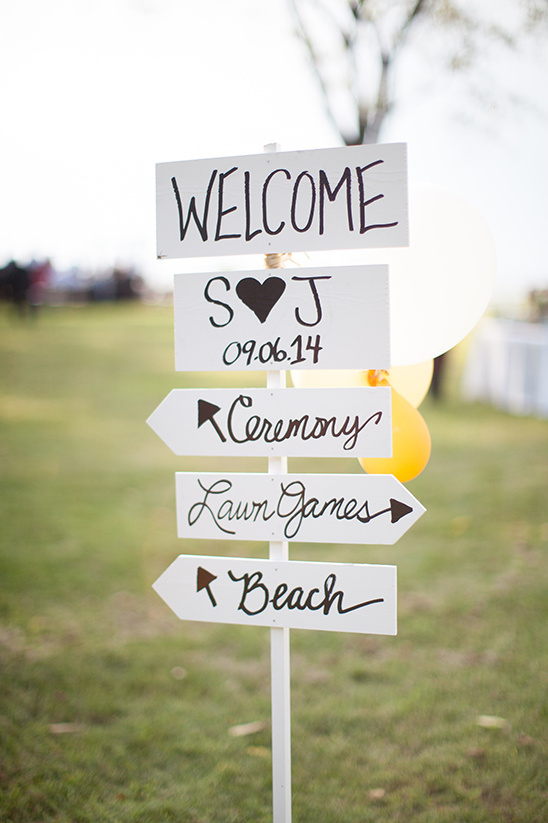 Wedding directional sign ceremony lawn games and beach