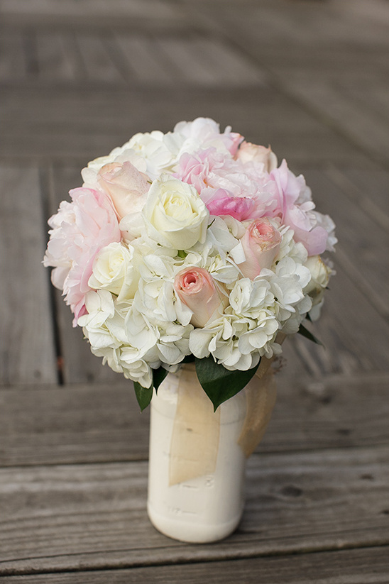 pink and white wedding bouquet by Petal Place Florist @weddingchicks