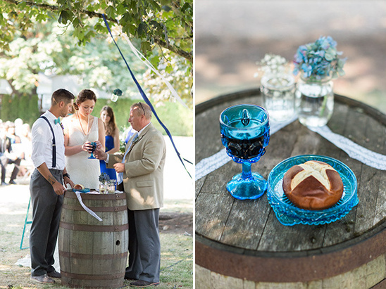 Rustic wedding ceremony with wine, bread, and blue details