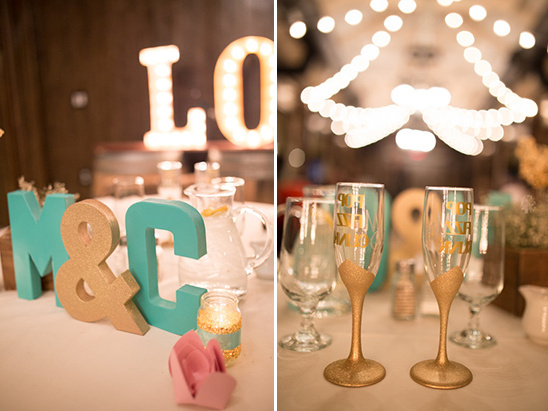 Wedding decor with glowing LOVE letters and champagne glasses