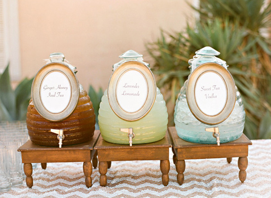Three beverage dispensers Ginger Honey Tea Lavender Lemonade and Sweet Tea