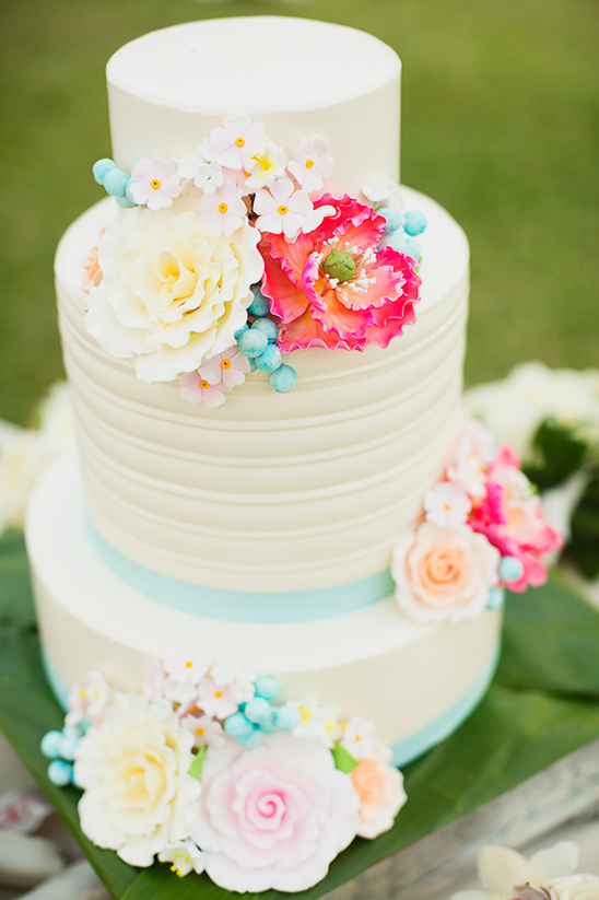tropical blue and pink wedding cake @weddingchicks