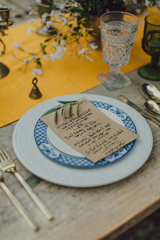 Elegant table setting with menu and floral accents