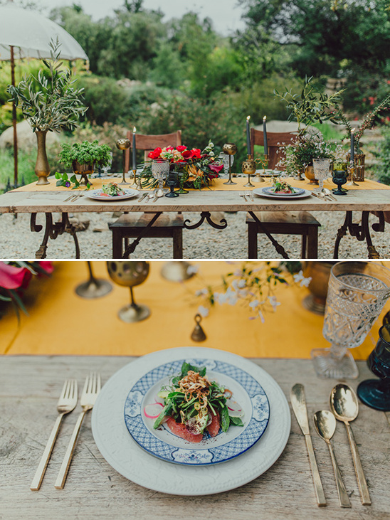 Outdoor wedding table setting with floral centerpiece