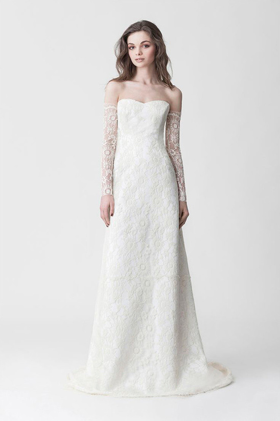 Elegant bride in a lace wedding dress with long sleeves
