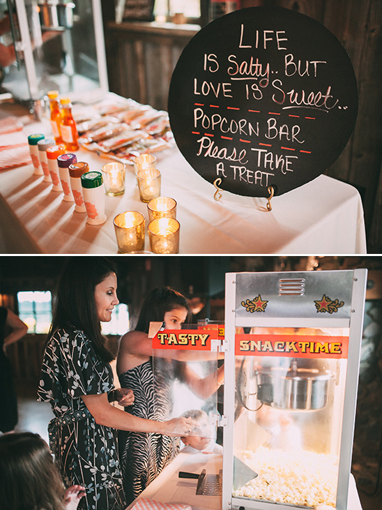 Wedding popcorn bar with quote and people at snack machine