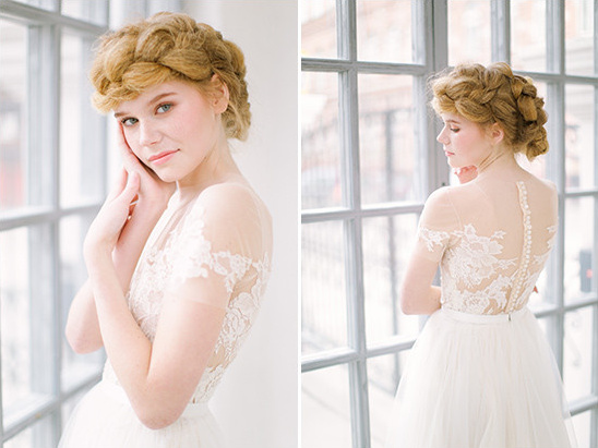 Elegant bride with a braided hairstyle and lace wedding dress