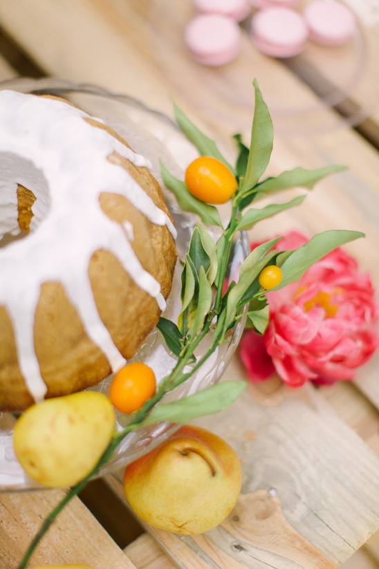 Delicious bundt cake decorated with fruits and flowers