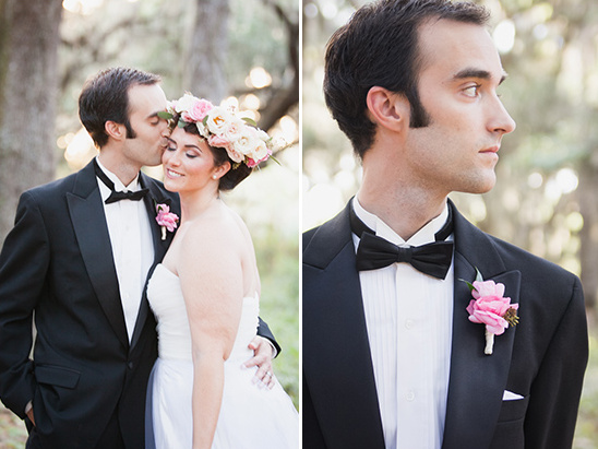 Romantic couple in wedding attire, groom kissing his bride