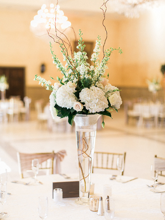 Elegant floral centerpiece on a wedding reception table