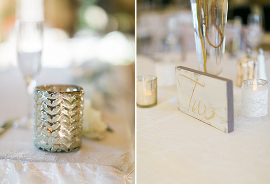 Elegant wedding table decor with candles and table number two