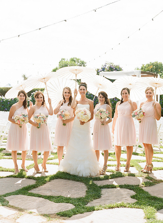 blush bridesmaid dresses with umbrellas @weddingchicks