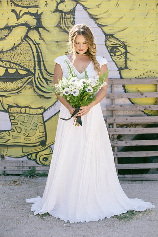 modern bridal gown with loose florals