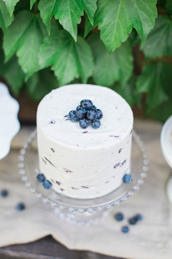 blueberry topped wedding cake @weddingchicks