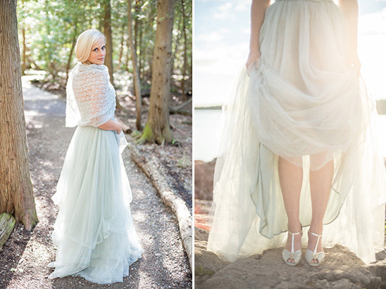 Dreamy light blue grey tulle gown worn by blonde outdoors