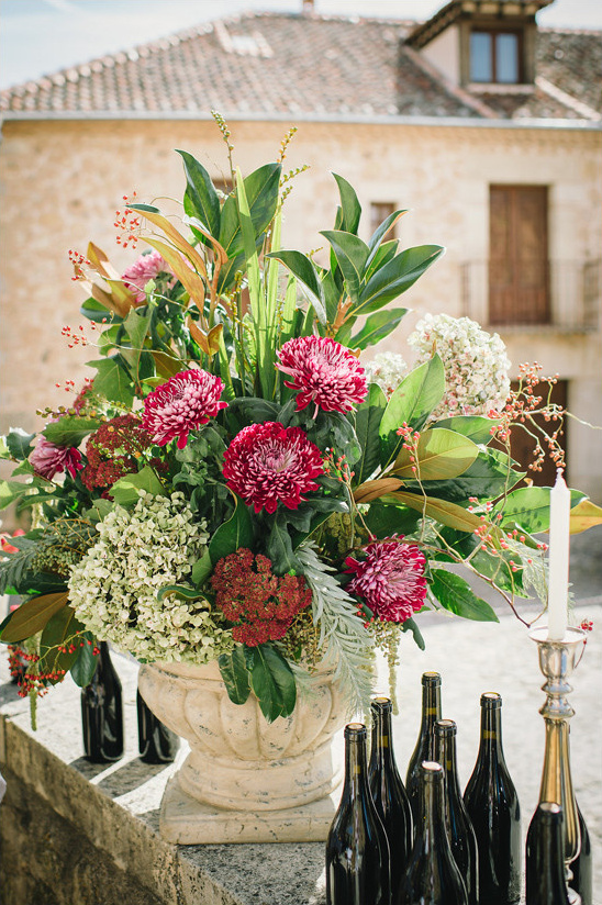 deep red and green flower arrangement @weddingchicks