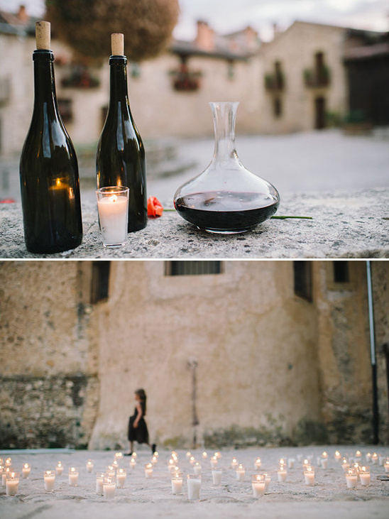 Romantic scene with wine, candles, and a little girl