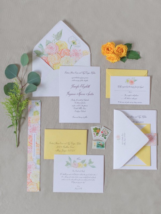 Elegant floral themed wedding invitation suite