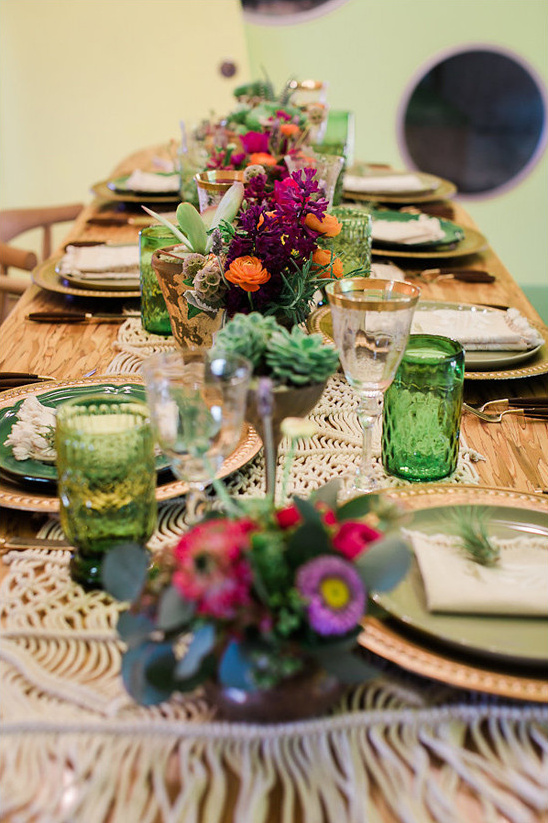 Elegant table setting with floral centerpieces and gold accents