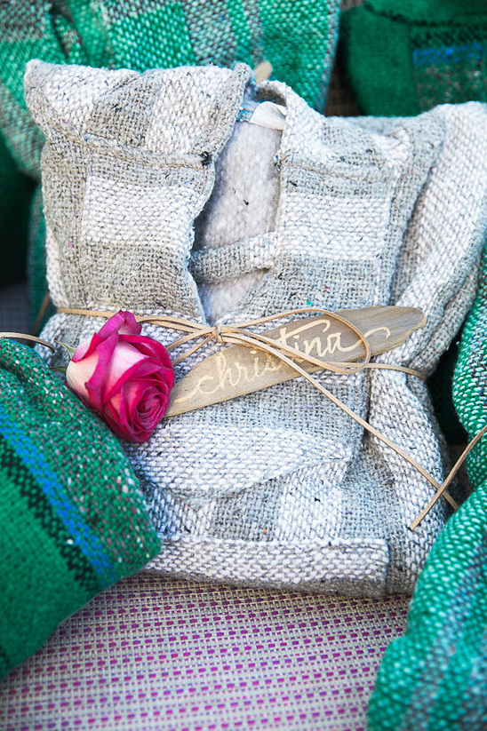 Gift wrapped with rustic fabric, rose, and a name tag