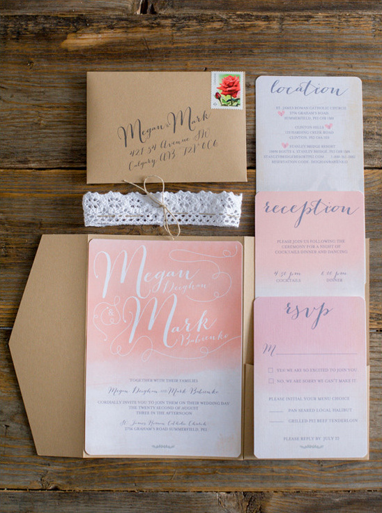 Elegant wedding invitation suite on wood background