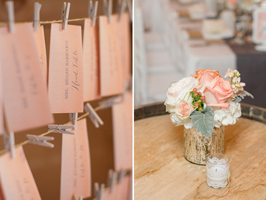 Wedding reception decor with seating cards and floral arrangement