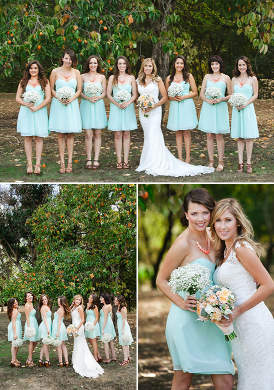 Bride and bridesmaids in pastel dresses at outdoor wedding