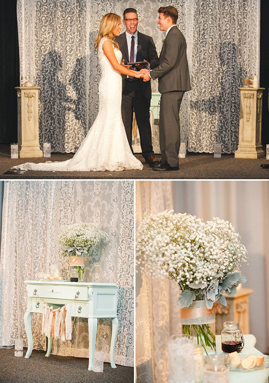 Wedding ceremony photo with bride, groom, officiant, and decor