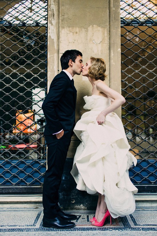 A newly married couple sharing a tender kiss on their wedding day
