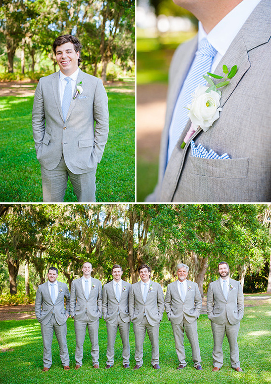 Groom and groomsmen in stylish light gray suits outdoors