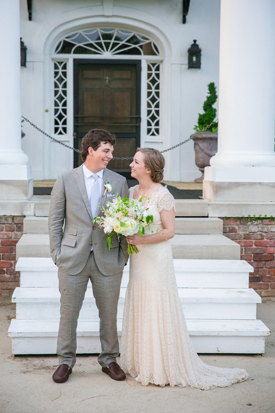 Happy bride and groom gaze lovingly on wedding day