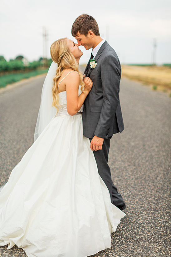 Bride and groom share a sweet moment on their wedding day