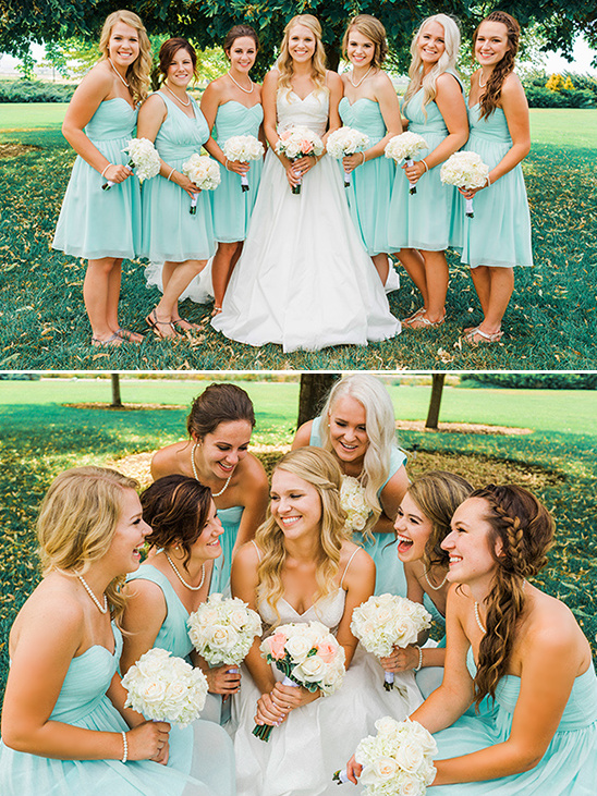 Bride and bridesmaids in aqua dresses at outdoor wedding